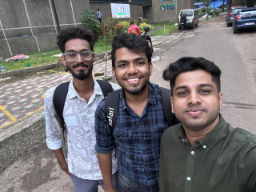 Friends posing on roadside